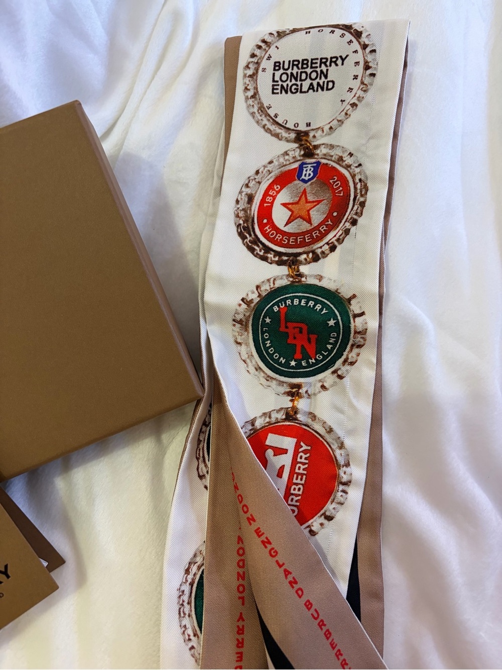 Burberry Silk Medal Print Twilly in White, Red, Green, Tan - Picture 2 of 9